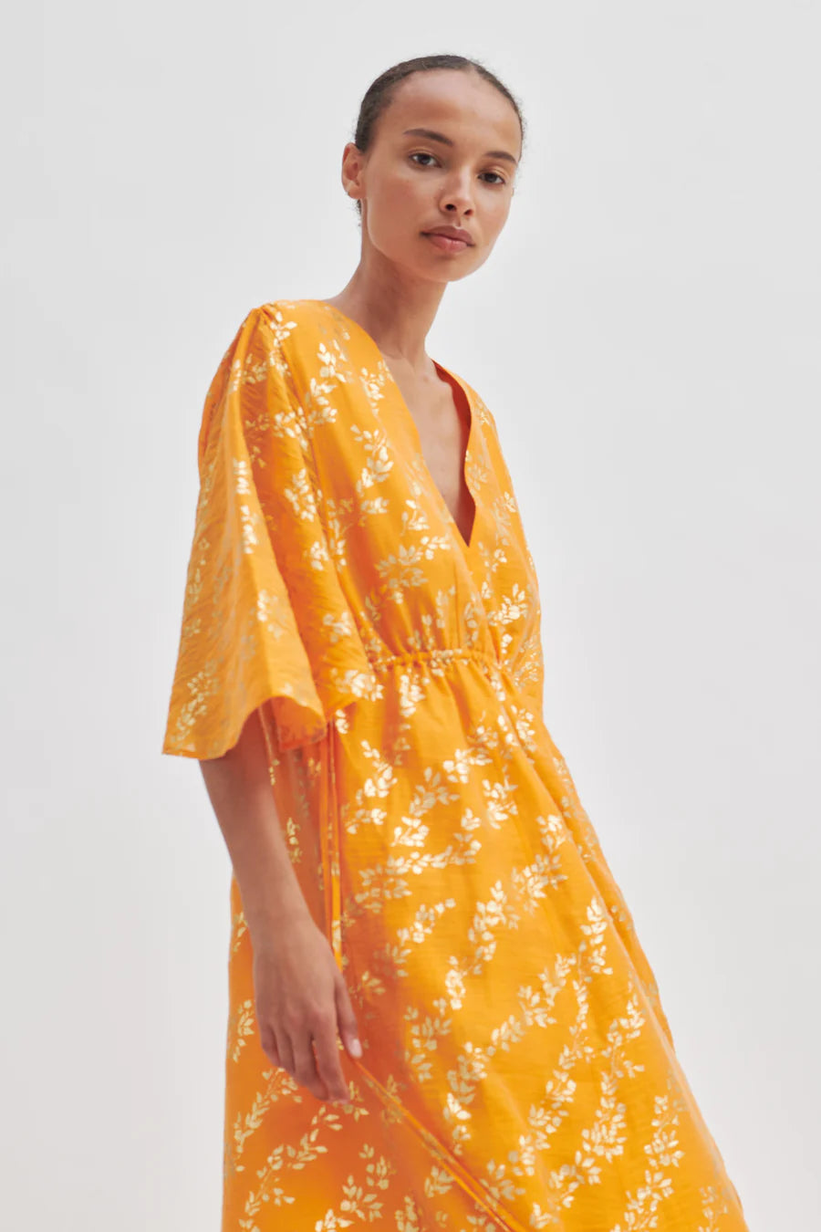 Honesty V Neck Gold Print Dress